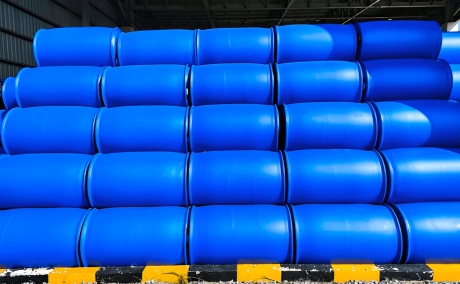 Recycled blue plastic drums